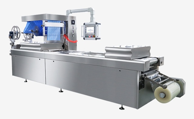 Máy đóng gói chân không băng tải tự động